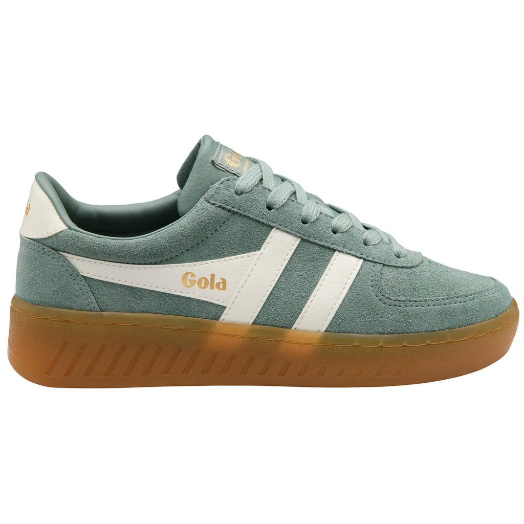 Gola women's trainer in green suede with white stripes and a brown sole
