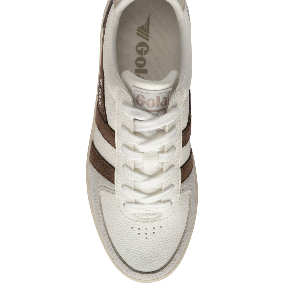 Top-down view of a Gola trainer in off-white with brown stripes and laces