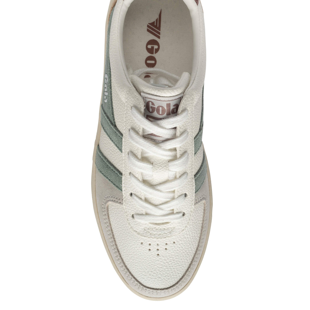 Top-down view of a Gola trainer in off-white with green stripes and brown branding