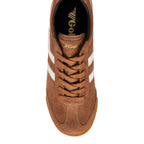Overhead view of a brown suede trainer with white stripes and brown laces