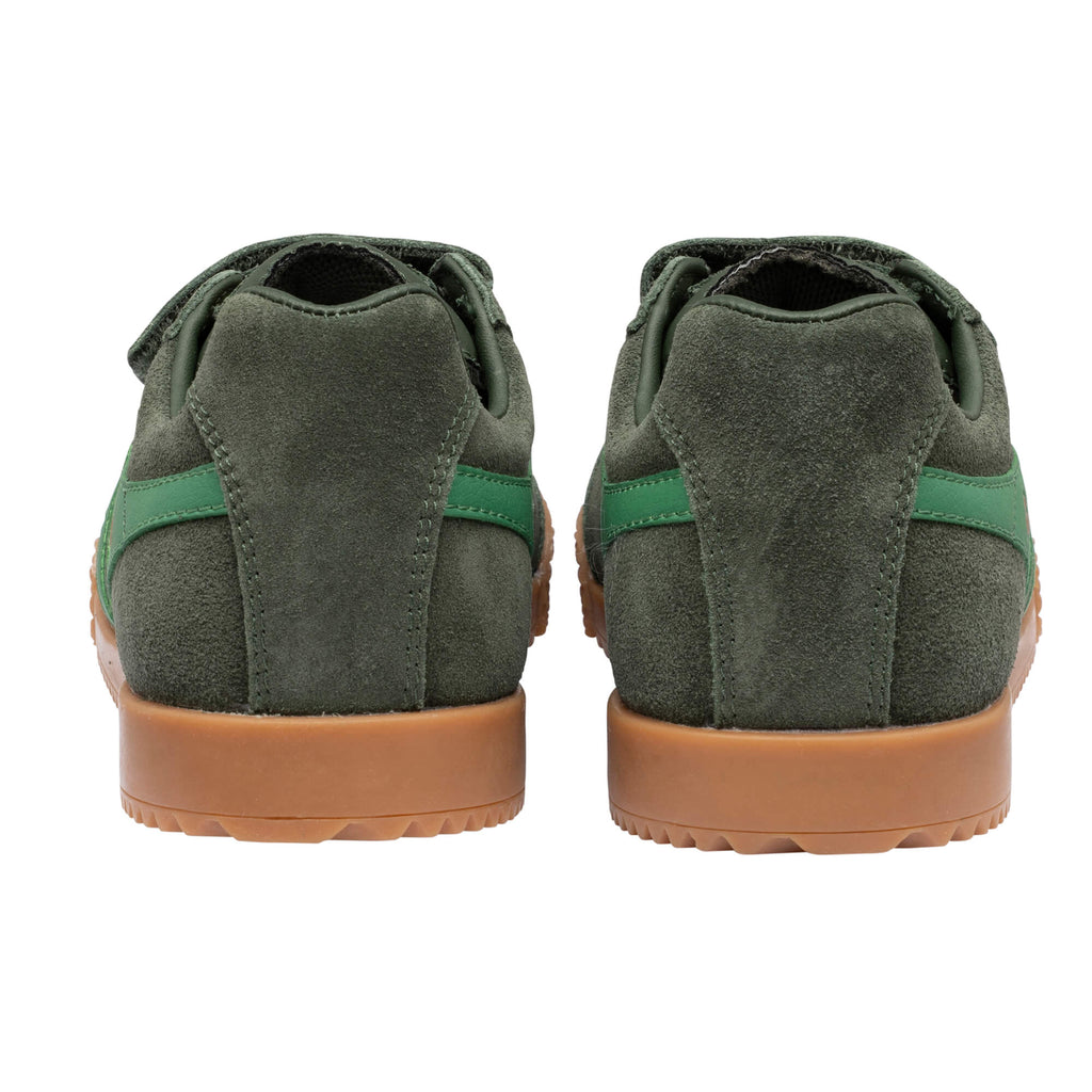 Pair of dark green suede trainers with green stripes and tan soles, rear view