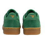 Pair of green suede trainers with brown soles, viewed from the back