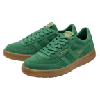 Pair of green Gola trainers with brown soles