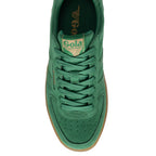 Top-down view of a green Gola trainer with a gum sole