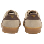 Rear view of two beige suede trainers with brown heel tabs and gum soles