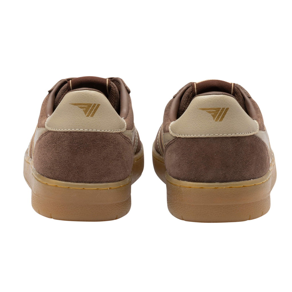 Pair of brown suede trainers with beige heel tabs and gum soles, rear view