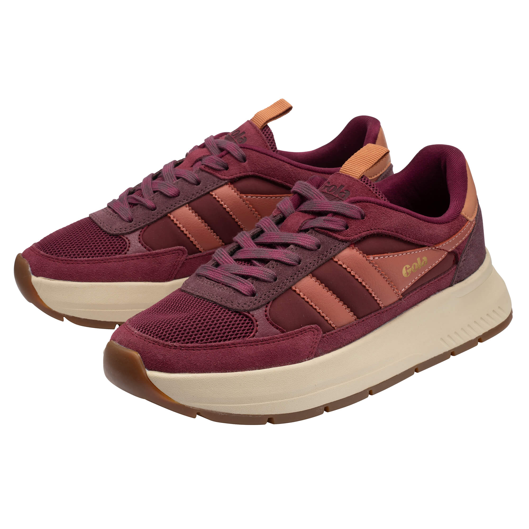 Pair of Gola women's trainers in burgundy with peach stripes and cream soles