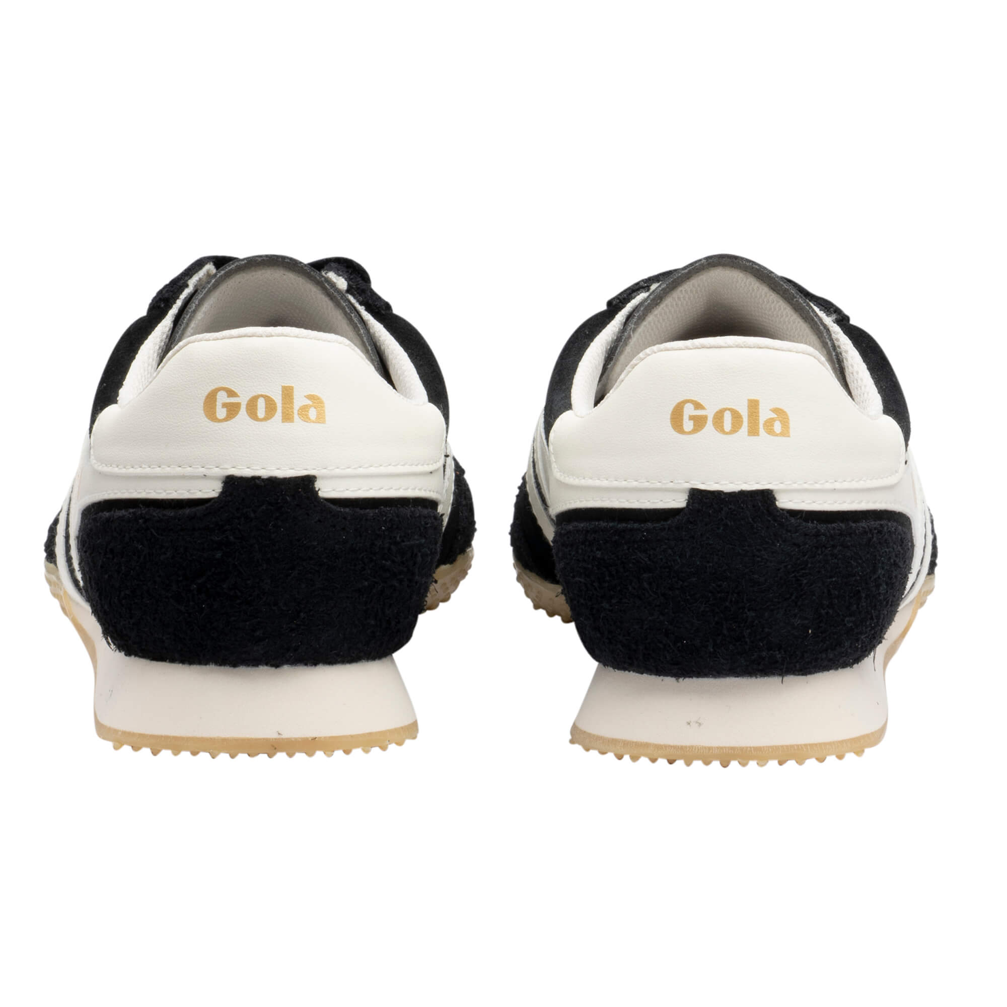 Rear view of black and white Gola trainers with gold Gola branding on the heel