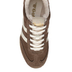 Brown suede trainer with white laces and white stripes on the side