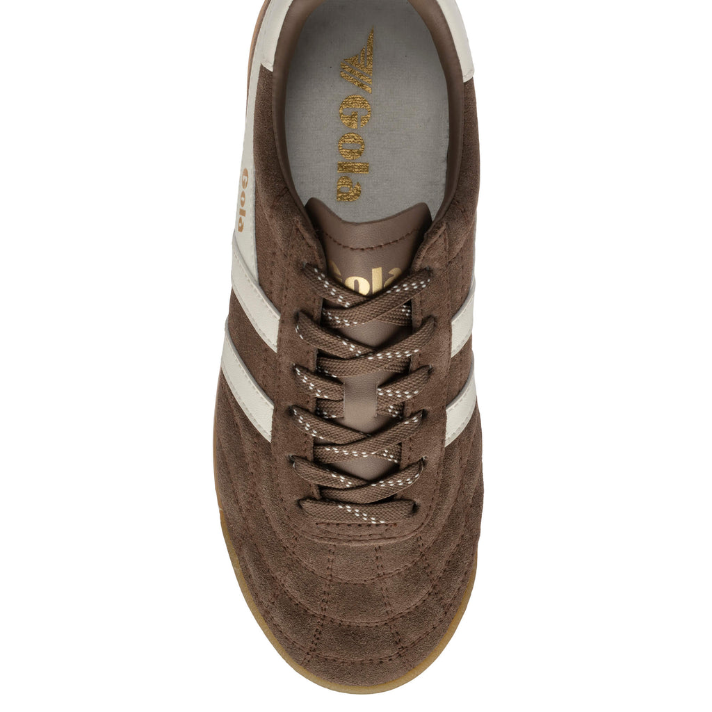 Top-down view of a brown suede Gola trainer with white stripes and brown laces