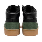 Pair of black, green, and white high-top trainers with tan soles, rear view