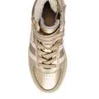 Gold high-top trainer with white stripes, laces, a side zip, and a cream faux fur lining