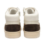 Pair of high-top trainers, rear view. Cream leather, brown suede, and leopard print details. Zips on inner ankles