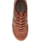 Top-down view of a Gola Harrier trainer in dusky pink with beige stripes and laces