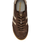 Brown Gola trainer with gold stripes and gold Gola branding on the tongue