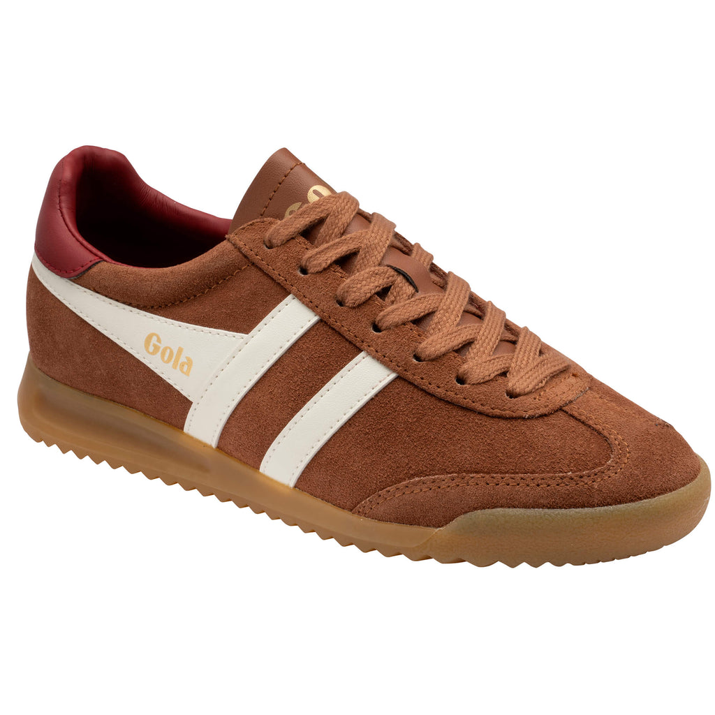 Brown suede trainer with white stripes and a red heel tab
