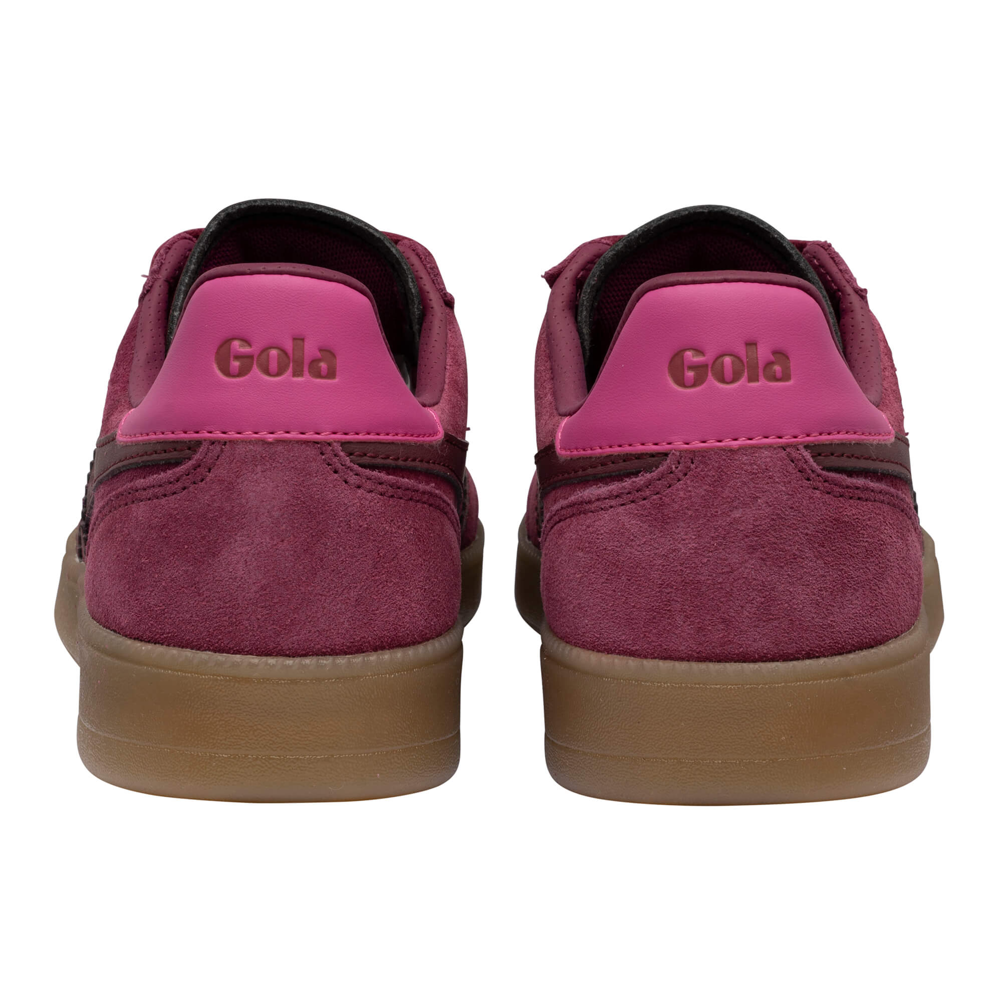 Pair of Gola trainers, back view. Burgundy suede with pink heel tab and Gola logo. Brown rubber sole