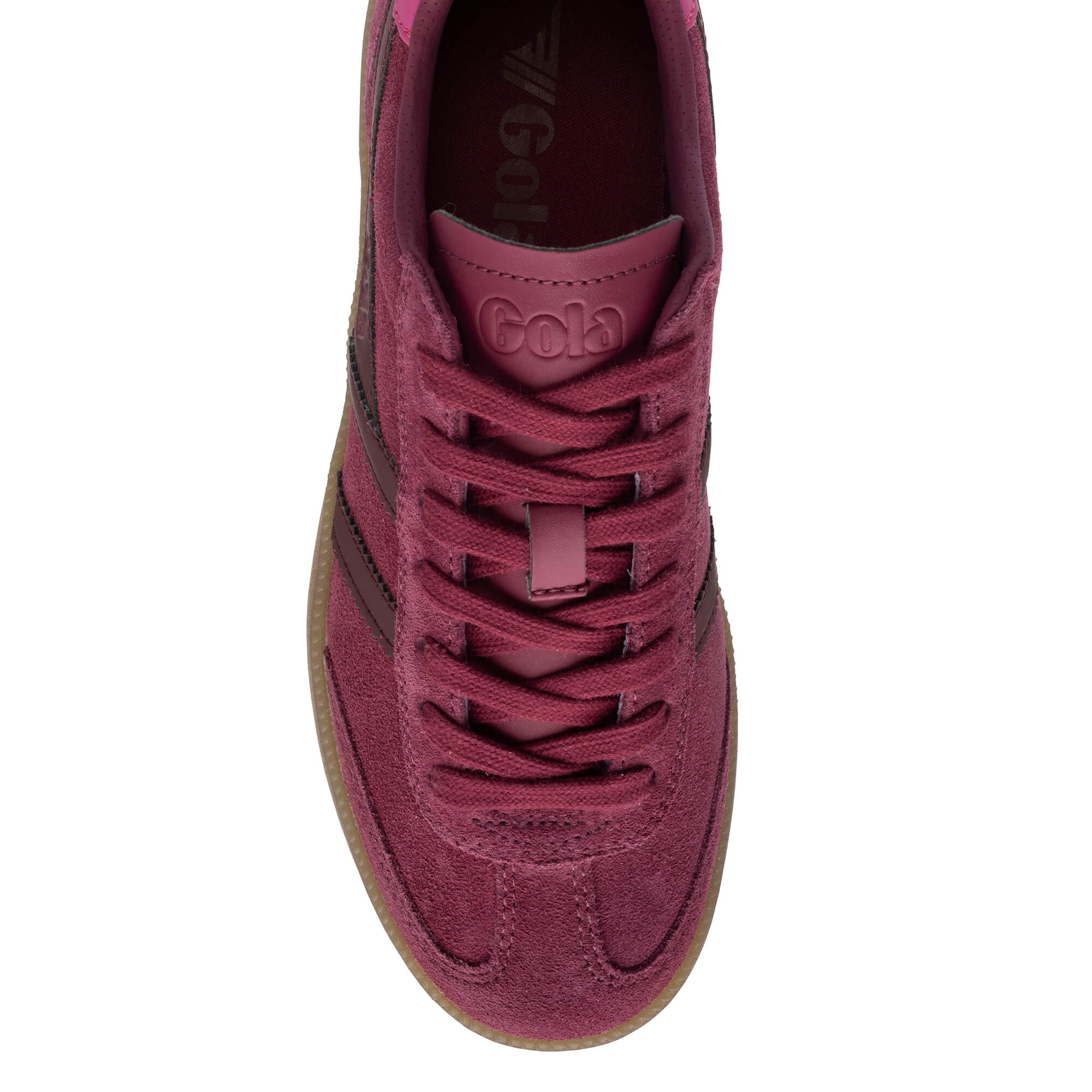 Close up of a Gola trainer in burgundy suede with matching laces and a gum sole