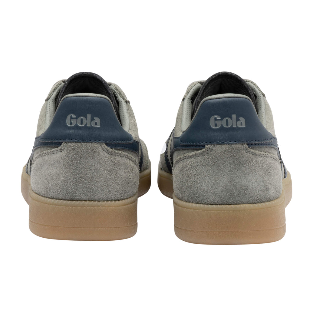 Rear view of two grey Gola trainers with navy blue accents and tan soles