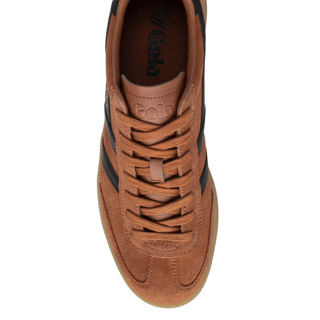 Top-down view of a brown Gola trainer with black stripes and laces
