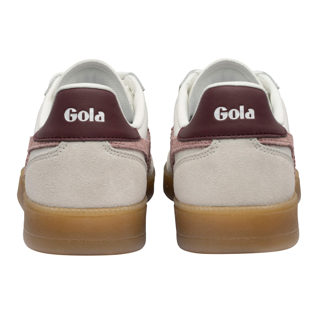 Pair of Gola trainers, white with burgundy and pink accents, gum sole, rear view
