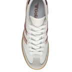 Top-down view of a white Gola trainer with pink stripes and a light brown sole