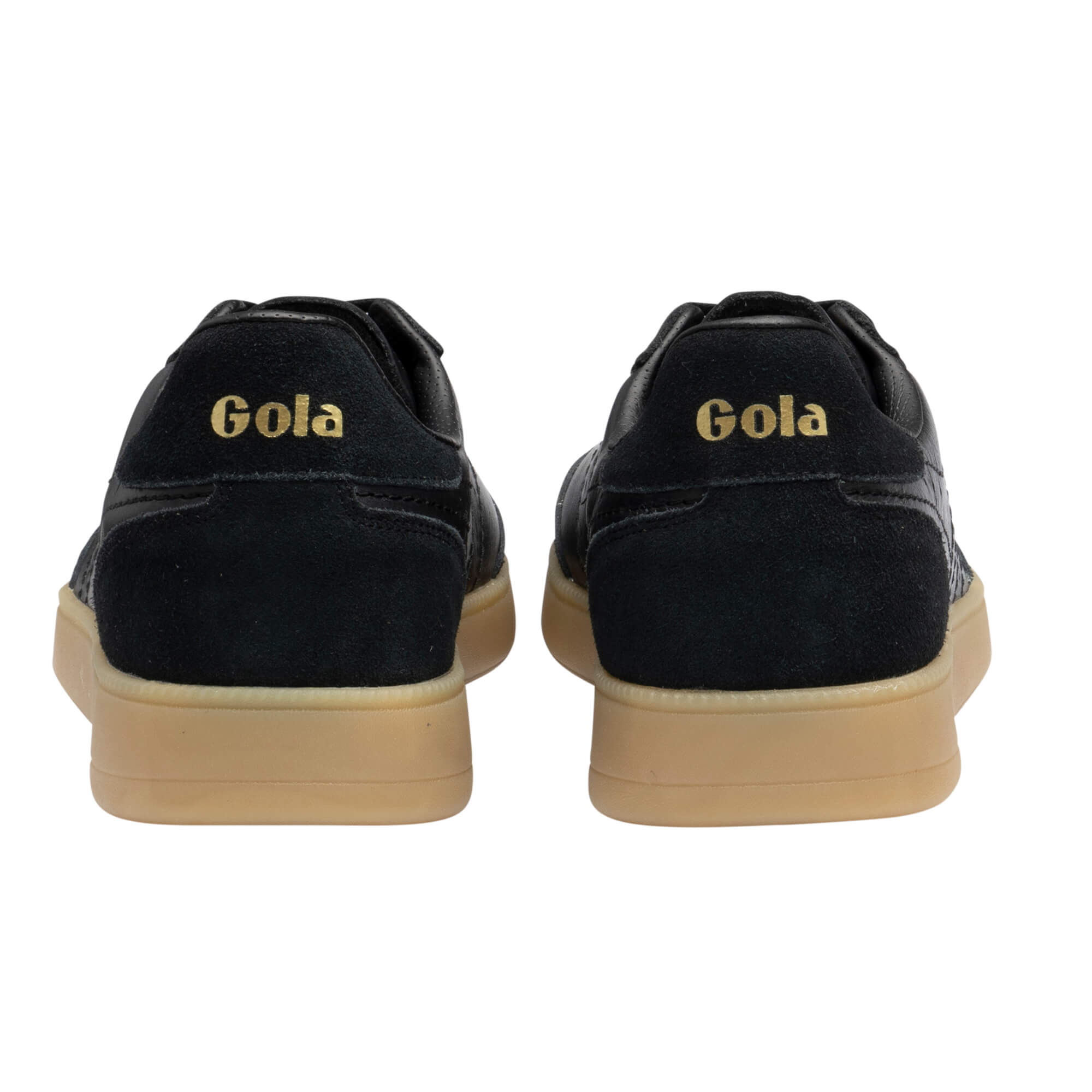 Pair of black Gola trainers with tan soles, rear view