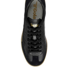 Black Gola Harrier trainers with gold Gola branding on the tongue and insole