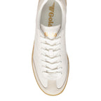 Top-down view of a white Gola trainer with gold branding and a light brown sole