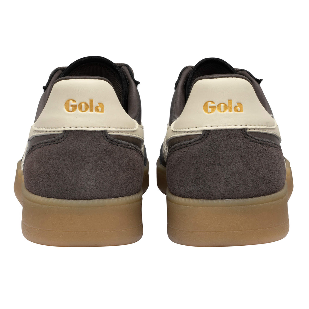 Pair of Gola trainers, dark grey suede with cream trim and gold Gola branding, rear view